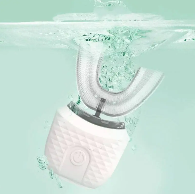 U-shaped toothbrush mouthpiece fitting all teeth simultaneously for thorough cleaning