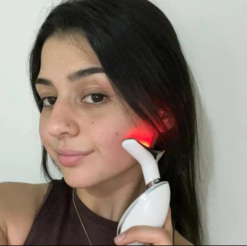 LED facial massager in use for 5-minute daily skin treatment at home