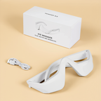 Flat lay of the eye massager with USB-C charging cable