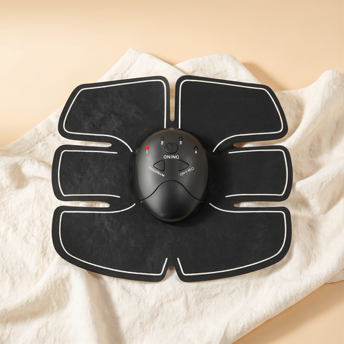 Black abdominal muscle stimulator toner, single product studio shot