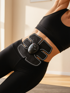 Woman wearing the abdominal muscle stimulator toner